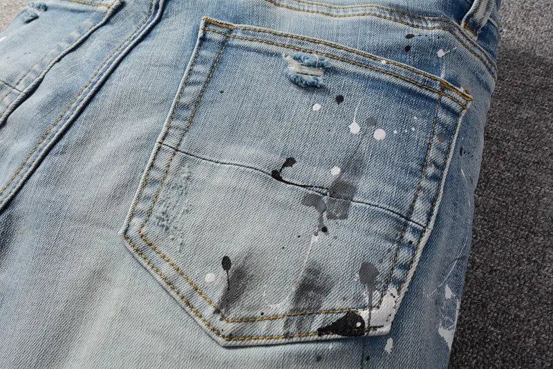 Fashionable Light Blue Stretch Denim Jeans with Patches