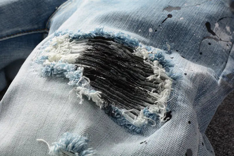 Fashionable Light Blue Stretch Denim Jeans with Patches